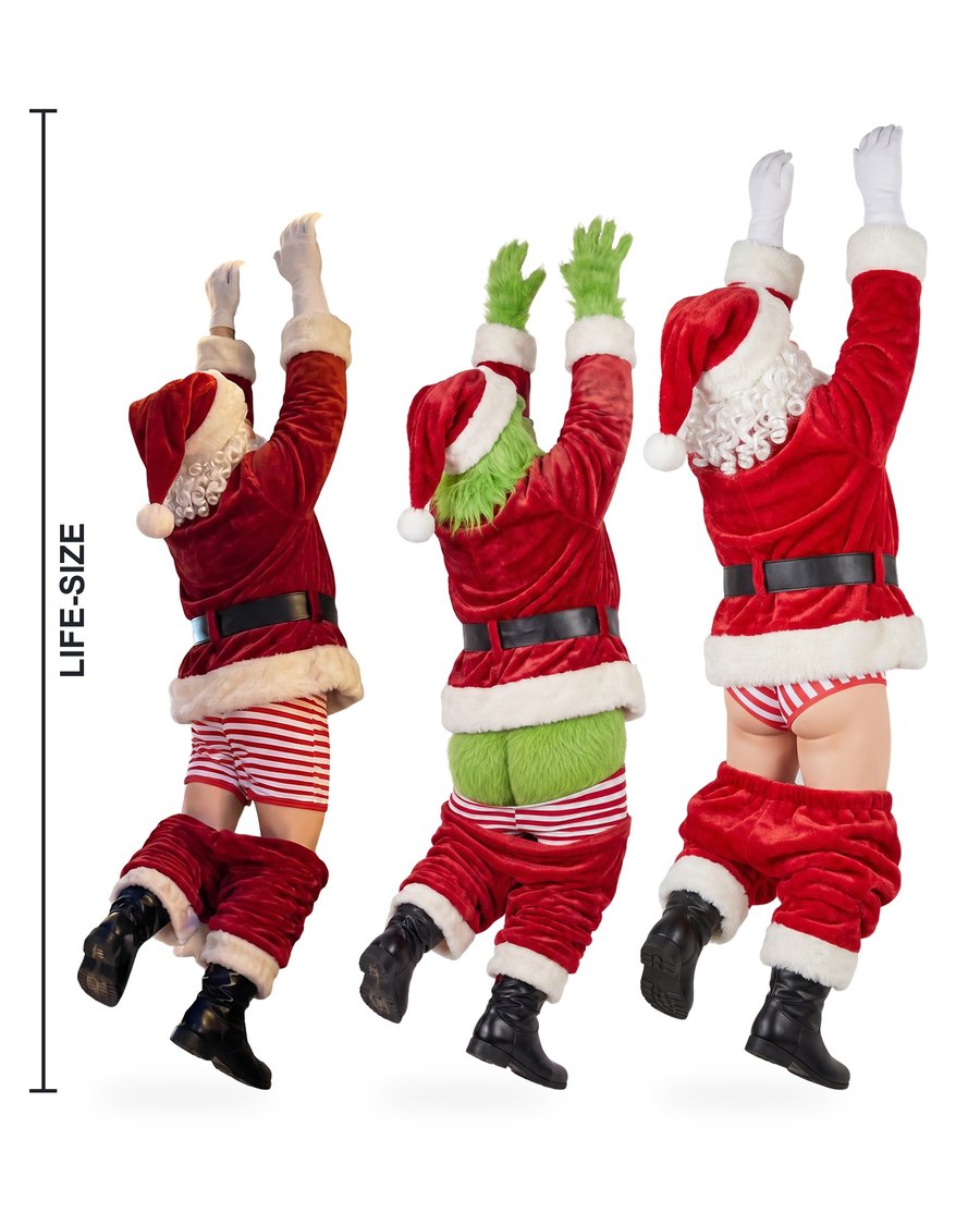 Oops Claus hanging from a gutter with his pants down